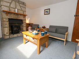 A living room with a sofa and coffee table at NO 10 Fortuneswell