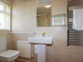 A bathroom with a sink and toilet at Tregoning annex in Lerryn near Lostwithiel