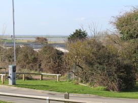 Outdoor view with bushes and trees at Kent Coast Holiday Park - Holiday Accommodation 22252, Rochester, Kent