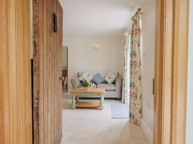 A living room with a sofa and coffee table at Harbins Farm Glanvilles Wootton Nr. Sherborne