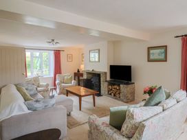 A living room with a sofa and armchairs at Harbins Farm Glanvilles Wootton Nr. Sherborne