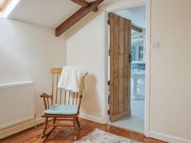 A rocking chair in a bathroom at Harbins Farm Glanvilles Wootton Nr. Sherborne