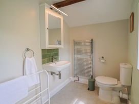 A bathroom with a wash basin and toilet at Harbins Farm Glanvilles Wootton Nr. Sherborne