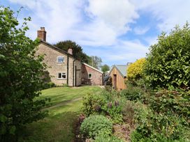 A house with a garden and shed at Harbins Farm Glanvilles Wootton Nr. Sherborne