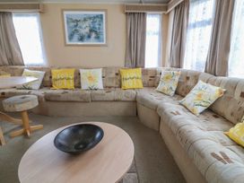 A living room with a corner sofa and coffee table at Winchester - 244