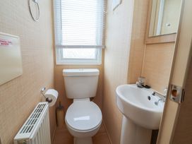 A bathroom with a toilet and sink at Winchester - 244