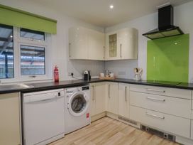 A kitchen with appliances and countertop at 2 North Road, Maiden Newton, Dorset