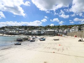 A view of boats on the beach at Wootton Gray in Penzance