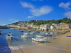 A harbor with boats and houses at Wootton Gray in Penzance