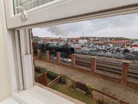 A train viewed from a window at Rails End in Whitby