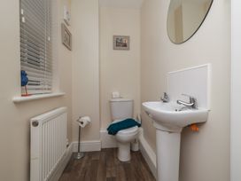 A bathroom with a sink and toilet at Rails End in Whitby