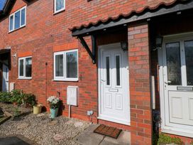 An entrance with a front door and plants at The Gower Gateway in Gowerton near Swansea