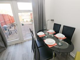 A dining room with a table and chairs at The Gower Gateway in Gowerton near Swansea