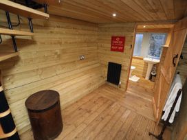 A bathroom with a toilet and sink at Hapus Yurt - Two Beautiful Yurts and Barn Cottage
