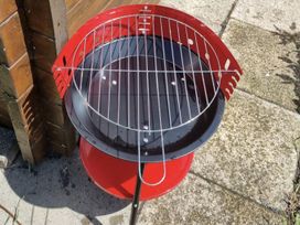 A grill on a patio at tbc 