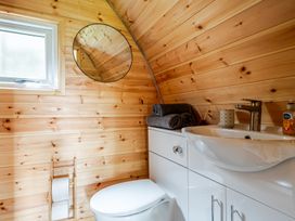 A bathroom with a sink and toilet at Peaceful pod with bay views, walk to 3 beaches St Ives