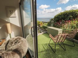 A balcony with a view of the beach at Hillsover in Saltburn-by-the-Sea