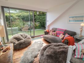 A living room with bean bags and a sliding door at Hillsover in Saltburn-by-the-Sea