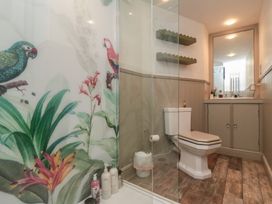 A bathroom with a shower and toilet at Hillsover in Saltburn-by-the-Sea