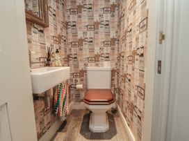 A bathroom with a toilet and sink at Hillsover in Saltburn-by-the-Sea