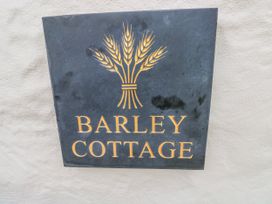 A sign displaying the name Barley Cottage