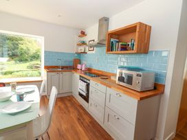 A kitchen with a sink and countertop at Artist’s Cottage in Cashel, County Tipperary