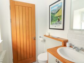 A bathroom with a sink and toilet at Artist’s Cottage in Cashel, County Tipperary