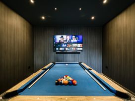 A game room with a pool table and television at Bounty Boutique on the Lakes in Bowness-On-Windermere