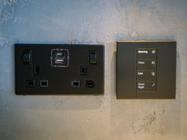A wall switch and power outlet with USB at Bounty Boutique on the Lakes Bowness-On-Windermere