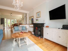 A living room with a sofa and coffee table at Millmead House Portesham