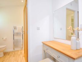 A bathroom with a toilet and towel rail at 3 Faraway Fields in Dobwalls