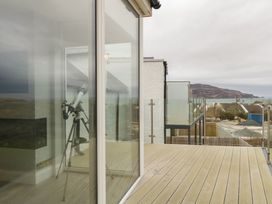 A balcony with a telescope and sea view at 2 Ard an Chuain Dunfanaghy