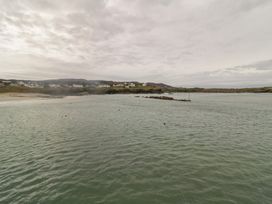 A coastal view with water and houses in the background at 2 Ard an Chuain, Dunfanaghy