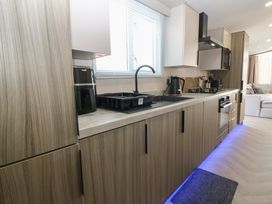 A kitchen with a sink and appliances at Plot 243 - Coldingham Bay Leisure Park Eyemouth
