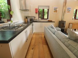 A kitchen with a sink and stove at The Lodge at Lamburn