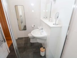 A bathroom with a sink and toilet at The Lodge at Lamburn