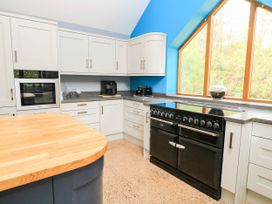 A kitchen with modern appliances at Hazeldene near Harvington