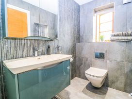 A bathroom with sink and toilet at Hazeldene near Harvington