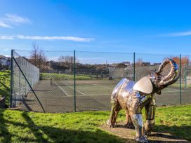An elephant sculpture near a tennis court at Warleggan in Portreath