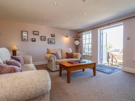 A living room with a sofa and coffee table at Annie's Place in Sleights