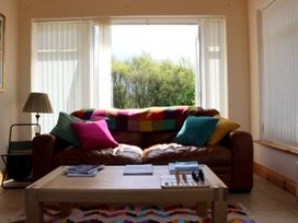 A living room with a sofa and coffee table at Welcome to the wild Atlantic way in Mulroy Bay