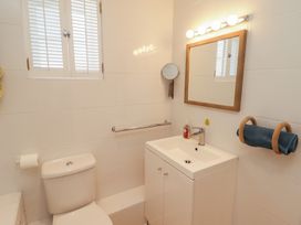 A bathroom with a toilet and wash basin at The Bolthole in Newport