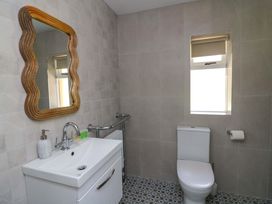 A bathroom with a sink and toilet at The Mews @ Derrybawn, Laragh, County Wicklow