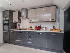 A kitchen with appliances and a countertop at 30 Prospect Hill in Whitby
