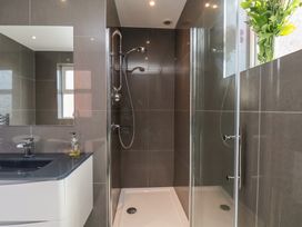 A bathroom with a shower and sink at 30 Prospect Hill in Whitby