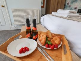 A tray with champagne bottles and croissants at 30 Prospect Hill in Whitby