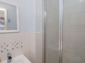 A bathroom with a sink and shower at 30 Prospect Hill in Whitby