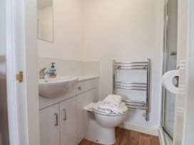 A bathroom with a sink and toilet at 30 Prospect Hill in Whitby