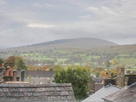 A view of rooftops and hills at Sedbergh Penthouse - KingBed - Tv - Wifi Sedbergh