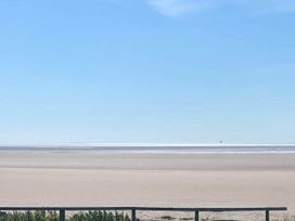 A view of the sea and sand at Beachside Lodge - Sleeps 6 - Pets ok - Parking in Heysham